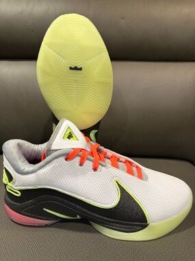Nike White Basketball Sneakers with Neon Yellow and Orange Accents